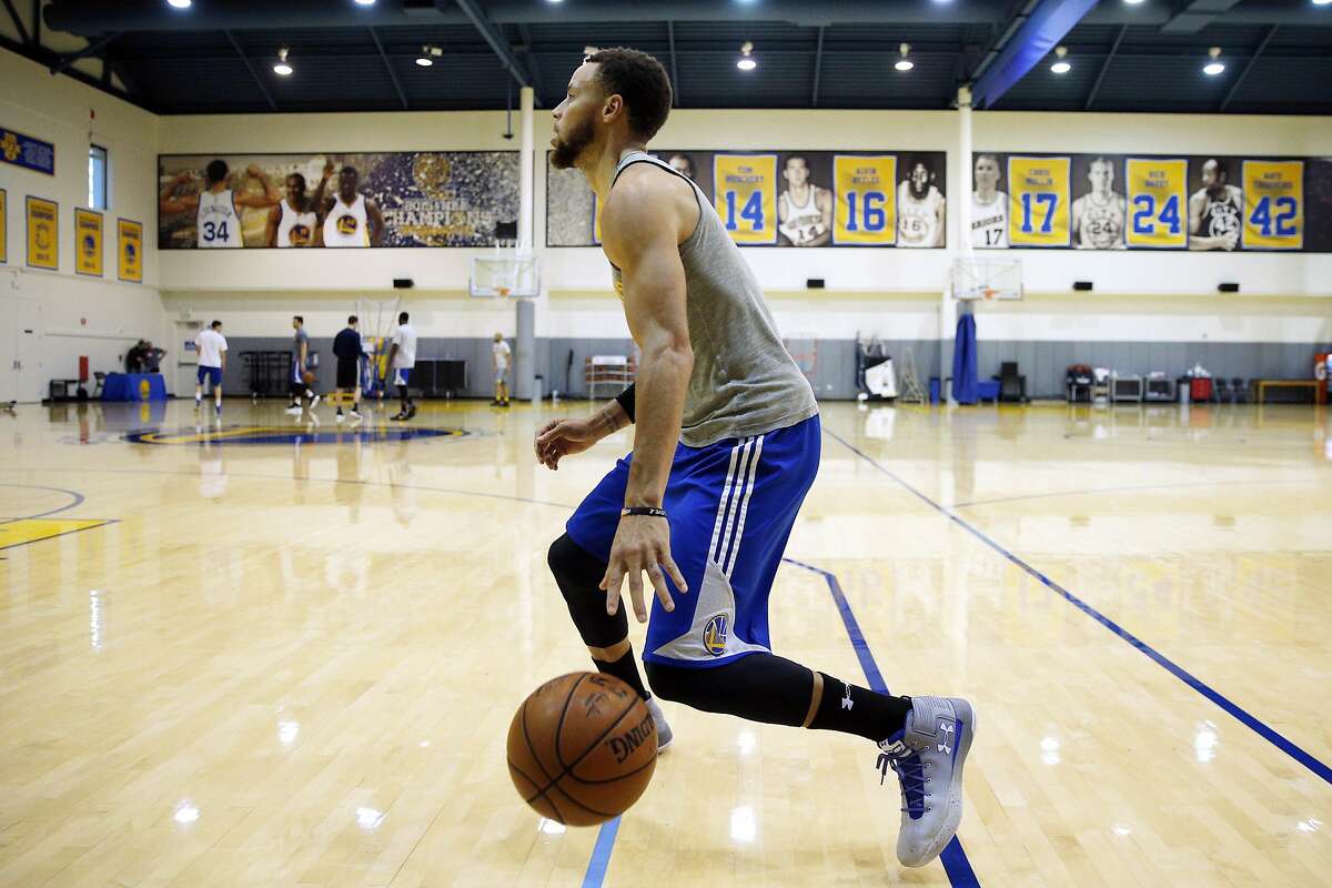 Golden State Warriors guard Stephen Curry (30) trains at the Warriors practice facility in Oakland. Curry's trainer says that the world will notice the improvement in his game this season.