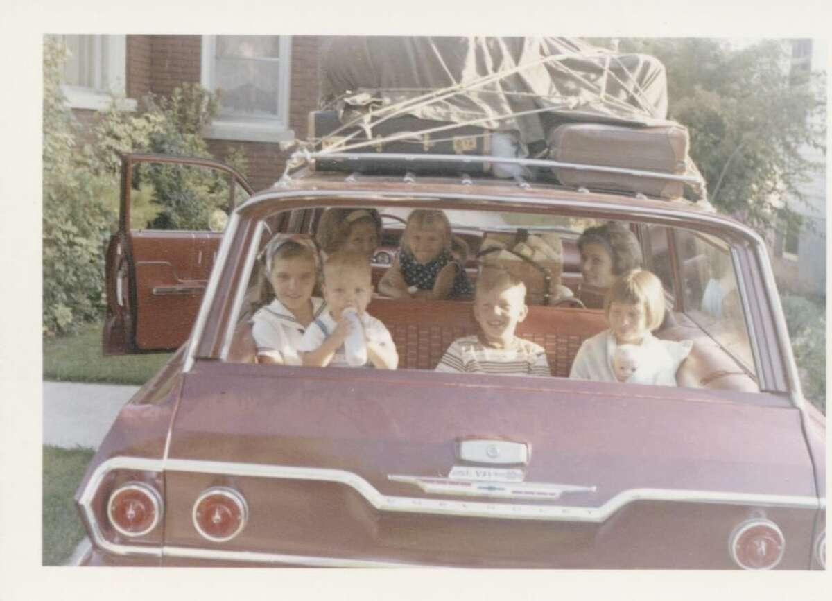 The Ward siblings packed into the family station wagon for a long road trip.