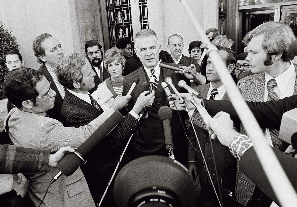 Reporters surround special prosecutor Archibald Cox, who was investigating Watergate and fired by President Richard Nixon in an episode known as the Saturday night massacre.