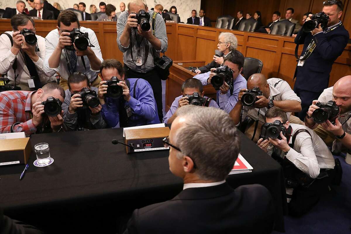 WASHINGTON, DC - MAY 11: Photographers focus on acting FBI Director Andrew McCabe as he prepares to testifiy with the other heads of the United States intelligence agencies before the Senate Intelligence Committee in the Hart Senate Office Building on Capitol Hill May 11, 2017 in Washington, DC. McCabe was testifying in place of former FBI Director James Comey, who was fired by President Donald Trump on Tuesday. (Photo by Chip Somodevilla/Getty Images)