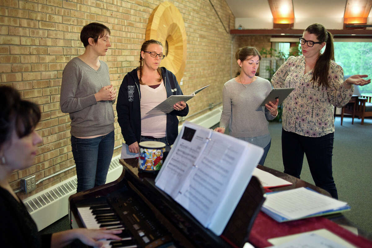 BRITTNEY LOHMILLER | blohmiller@mdn.net From left: Sara Taylor, April Millward, Melissa Bornemann, Tara Ell and Sarah Smith rehearse a song from their upcoming show 'Moms: We've Still Got It! Revue' at Creative360 Thursday evening. The performance starts at 3 p.m. on May 13 at Creative360 with prepaid tickets $15 and $18 at the door.