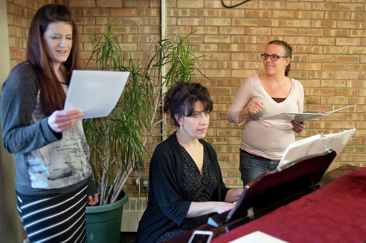 BRITTNEY LOHMILLER | blohmiller@mdn.net From left: Holly Booth, Sara Taylor and Melissa Bornemann rehearse a song from their upcoming show 'Moms: We've Still Got It! Revue' at Creative360 Thursday evening. The performance starts at 3 p.m. on May 13 at Creative360 with prepaid tickets $15 and $18 at the door.