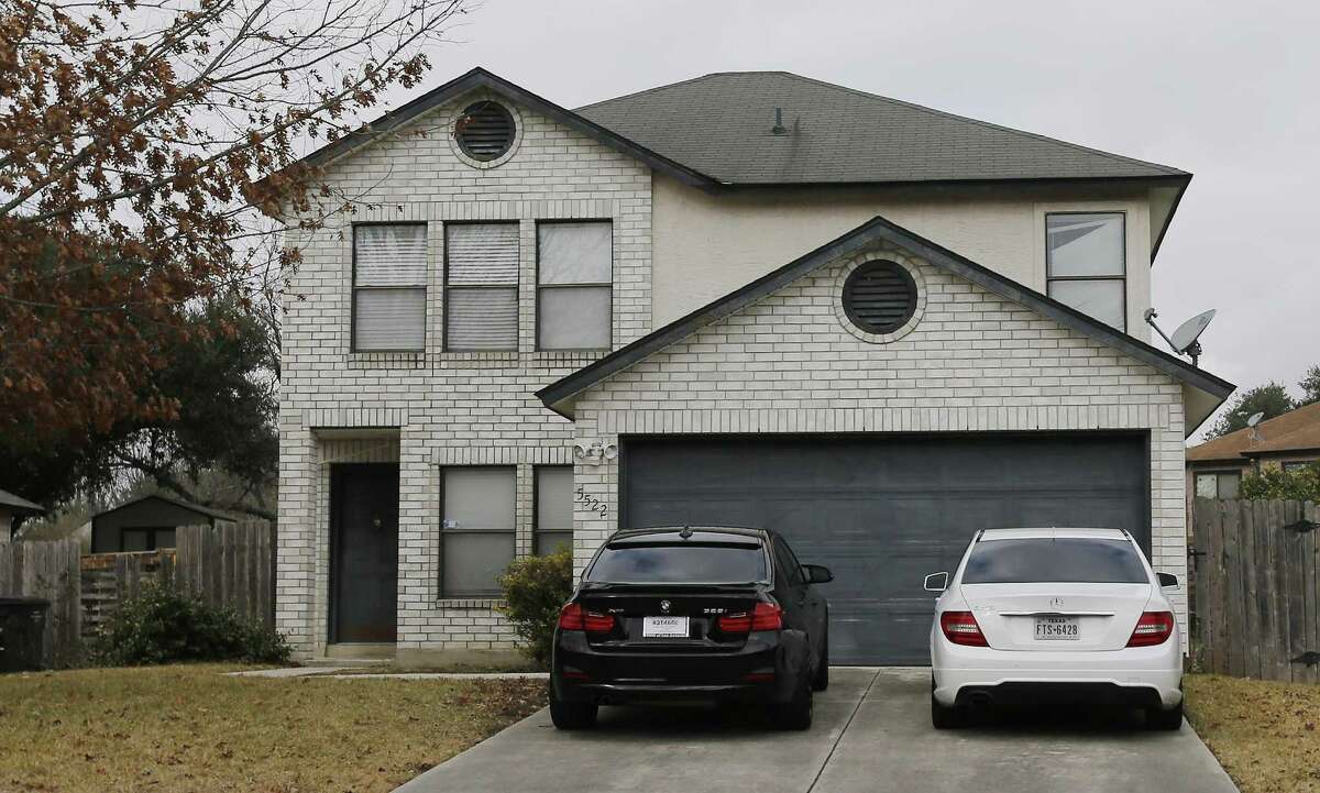 This home, in the 5500 block of Senisa Springs on the far West Side, was one of several locations raided by federal agents Thursday, Jan. 12, 2017. According to neighbors, agents arrested at least one person at the residence at about 6 a.m. Law officers raided several locations Thursday in and around San Antonio as part of an operation targeting a ring accused of distributing large quantities of methamphetamine and cocaine. More than 30 people are being targeted as part of at least two federal indictments returned last week, records show. Some were taken into custody as others were sought on an array of warrants issued this week, records show. Many of the suspects are with the Tango Orejon/Tango Blast gang, sources said. (Kin Man Hui/San Antonio Express-News)