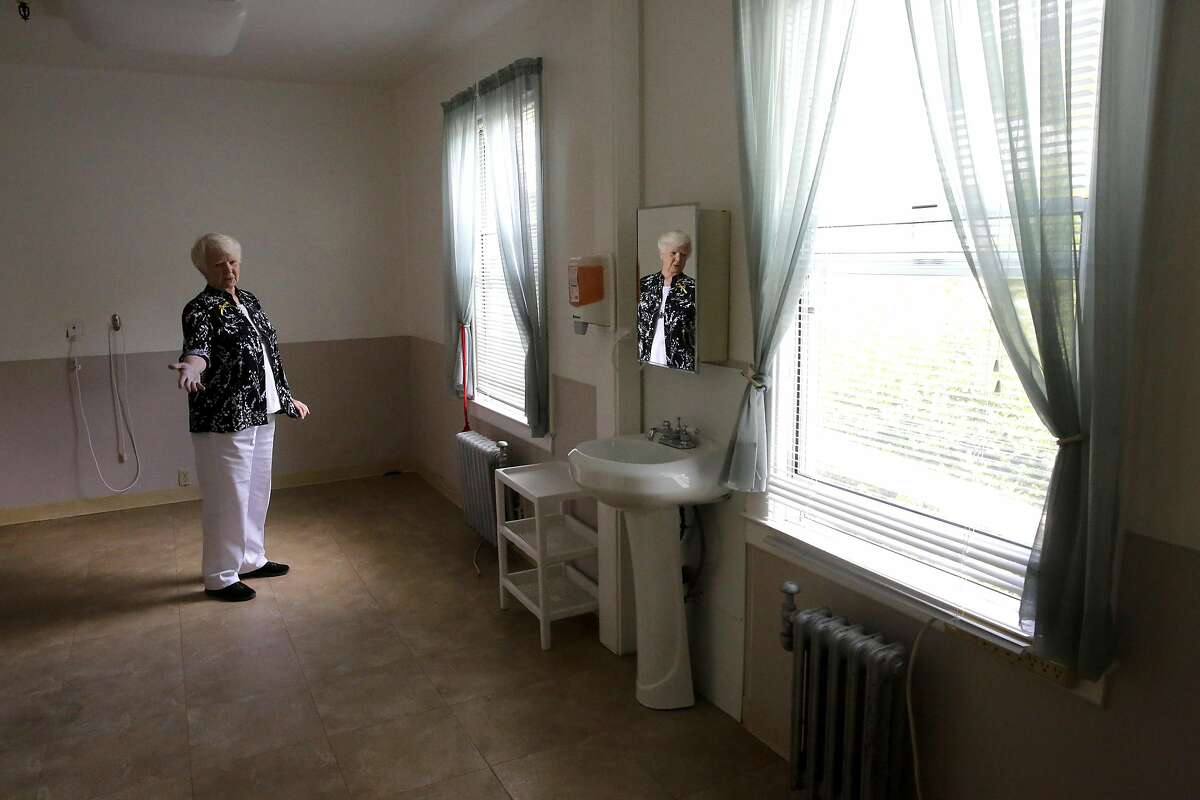 Sister Patricia, director shows what would become the kitchen and dining room area of the proposed project at the Lady of Lourdes Convent on Thursday May 11, 2017, San Rafael, Ca. The Lady of Lourdes convent is seeking permission from city of San Rafael to house two single mothers and their young kids in a vacant wing of their assisted living center where about 16 elderly nuns live.