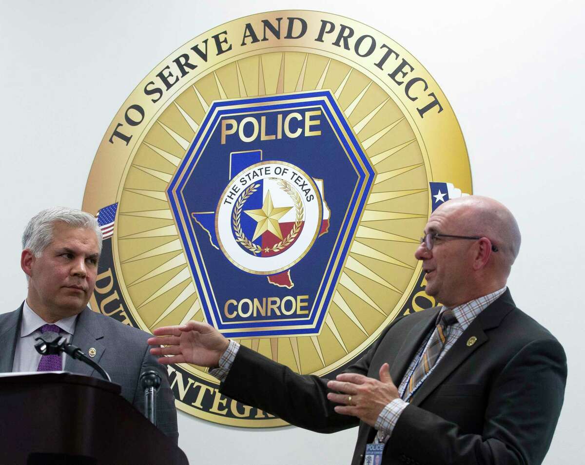 Conroe Police Chief Philip Dupuis, right, speaks next to Montgomery County District Attorney Brett Ligon during a press conference where the body camera video from a shooting involving Conroe police officer Greg Vradenburg was released Thursday, May 11, 2017, in Conroe. Christopher Ryan Hatton, 28, shot at Vradenburg following a traffic stop in January 2016. Hatton was convicted of first-degree felony aggravated assault of a public servant in 40 minutes gave him a 99-year sentence and a $10,000 fine. Hatton will not be eligible for parole until he is 58.