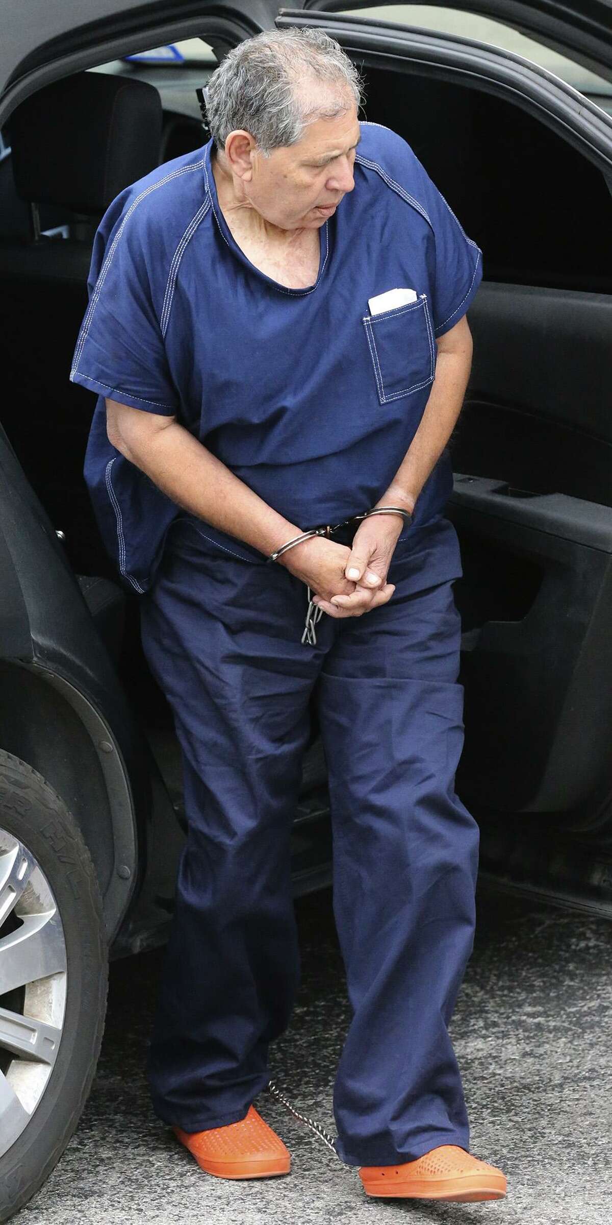 Roberto Martinez Gill exits a vehicle Friday February 3, 2017 at the rear of the John H. Wood, Jr. Federal Courthouse. Martinez-Gill, of San Antonio, was sent to prison for life in 1992 after a jury convicted him of possessing heroin and cocaine with intent to distribute. He sought repeatedly over the years to have his sentence overturned.