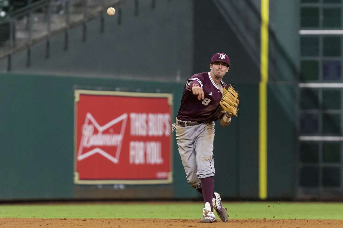 Texas A&M shortstop Braden Shewmake throws out a Baylor base runner at Minute Maid Park on March 5, 2017, in Houston.