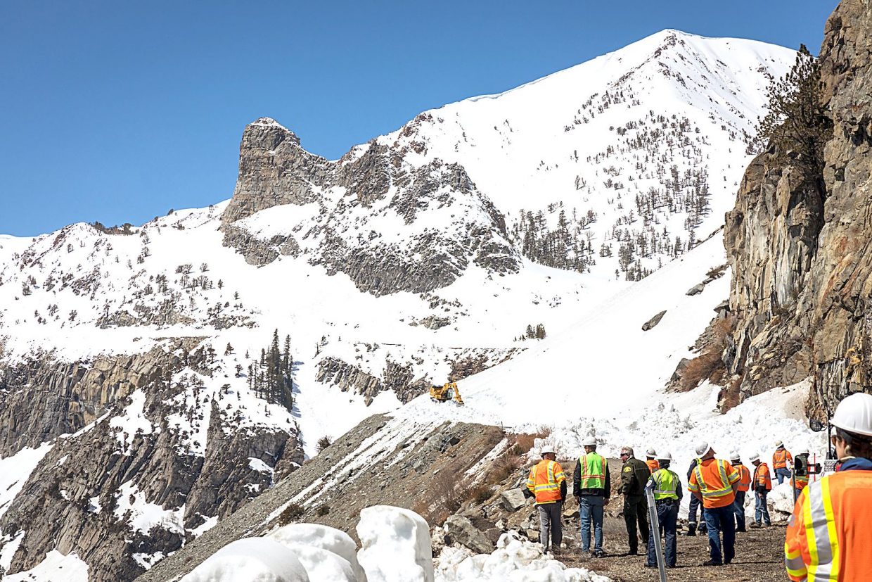 Caltrans workers clearing Tioga Pass encounter 50foothigh snowdrifts
