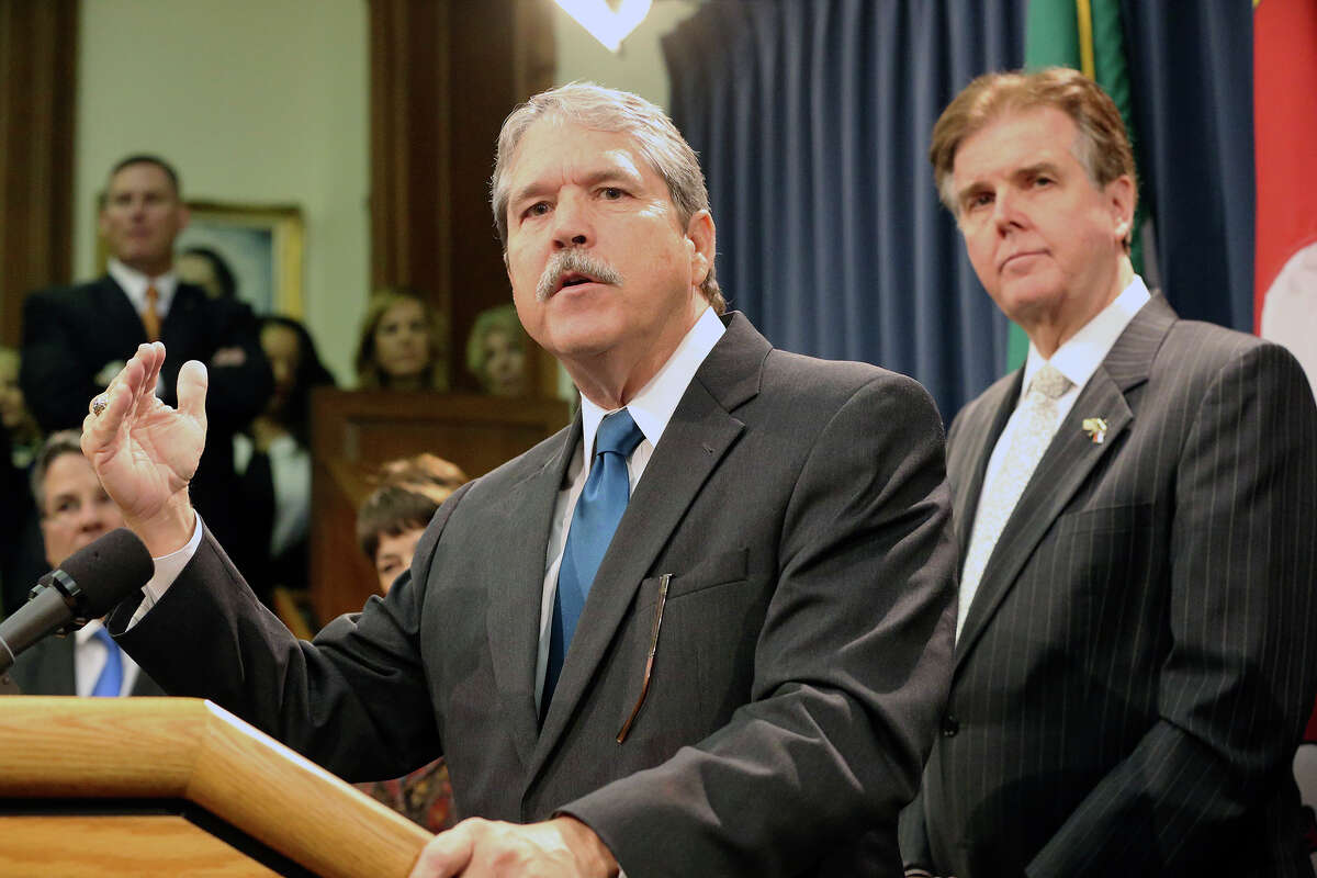 Sen. Larry Taylor, chairman of the Education Committee, stands with Lt. Gov. Dan Patrick (right). The two lawmakers want the House to pass a school choice bill that would subsidize private school tuition for students who qualify for special education. 