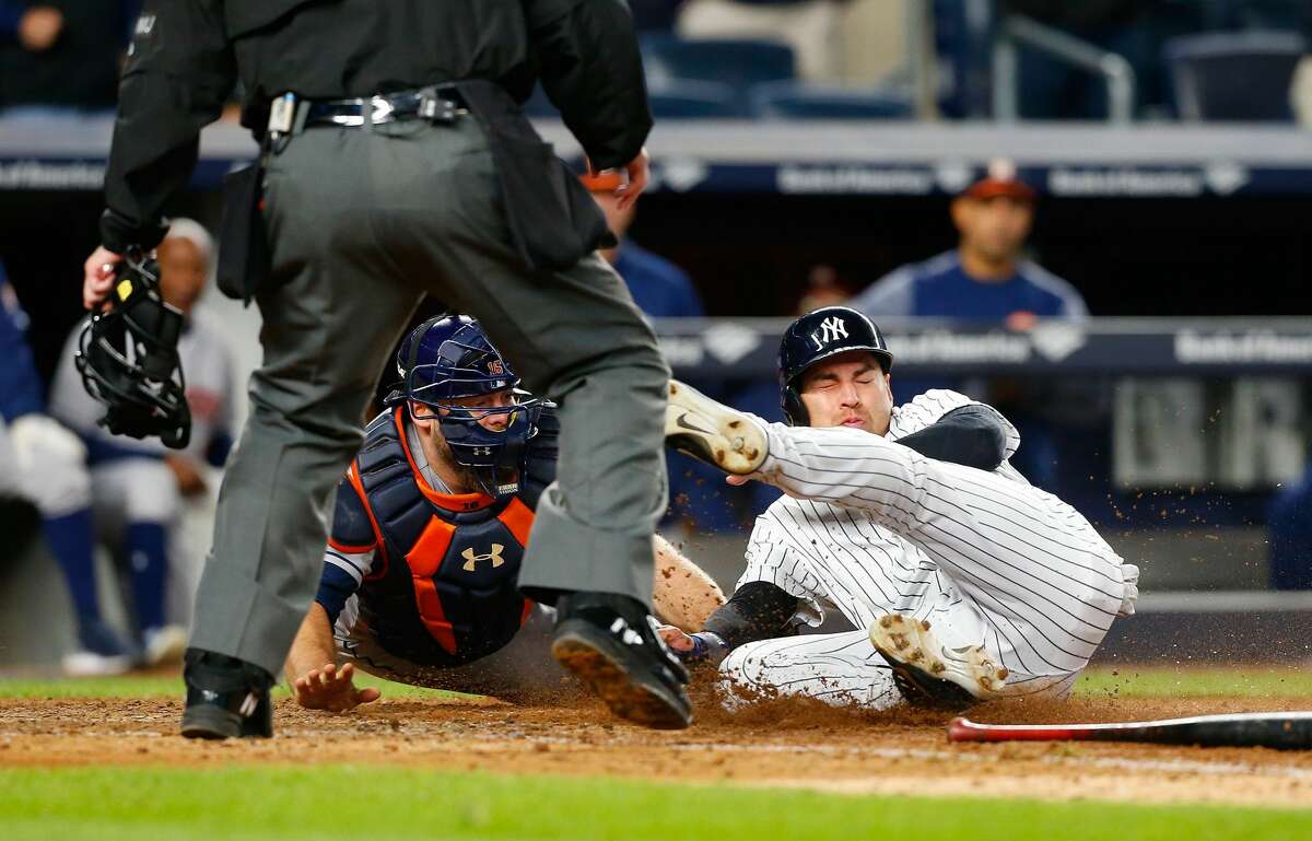NEW YORK, NY - MAY 11: Brian McCann #16 of the Houston Astros tags out Jacoby Ellsbury #22 of the New York Yankees to end their game at Yankee Stadium on May 11, 2017 in the Bronx borough of New York City. (Photo by Jim McIsaac/Getty Images)