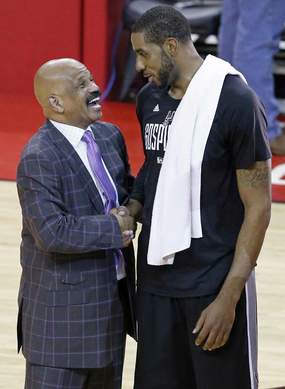 Former San Antonio Spurs player and coach John Lucas, who is the now the player development coach with the Houston Rockets, talks with San Antonio Spurs' LaMarcus Aldridge after Game 6 in the Western Conference semifinals held Thursday May 11, 2017 at the Toyota Center in Houston,Tx. The Spurs won 114-75.