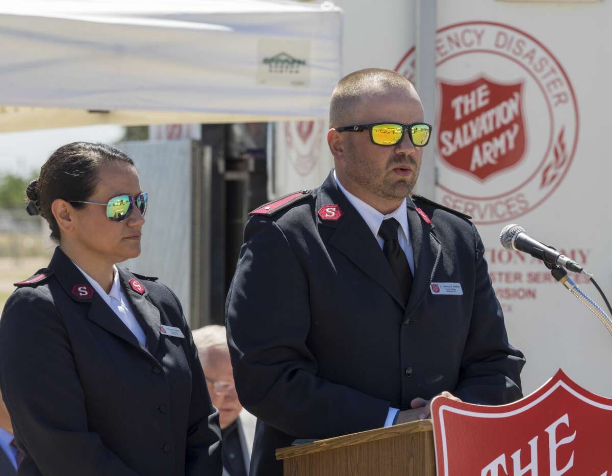 Lt. Michelle Walker and Lt. Jeremy Walker, with The Salvation Army, speak 5/11/17 during the ground breaking ceremony for a new emergency shelter to be built in Midland. Tim Fischer/Reporter-Telegram Tim Fischer/Reporter-Telegram