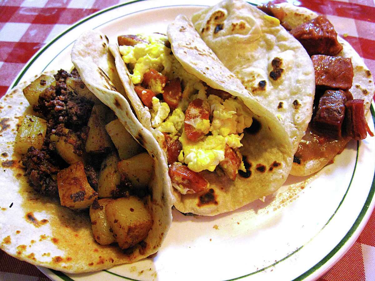 Weenies and eggs, Maria’s Cafe: In a cafe about the size of your first apartment, Maria’s turns out excellent, cheap breakfast tacos like chorizo and potato, left, and more hearty options like carne guisada, right. But weenies and eggs, center, in a hot, fresh flour tortilla are as satisfying as a ballpark hot dog. 1105 Nogalitos St., 210-227-7005, Facebook: Maria’s Cafe
