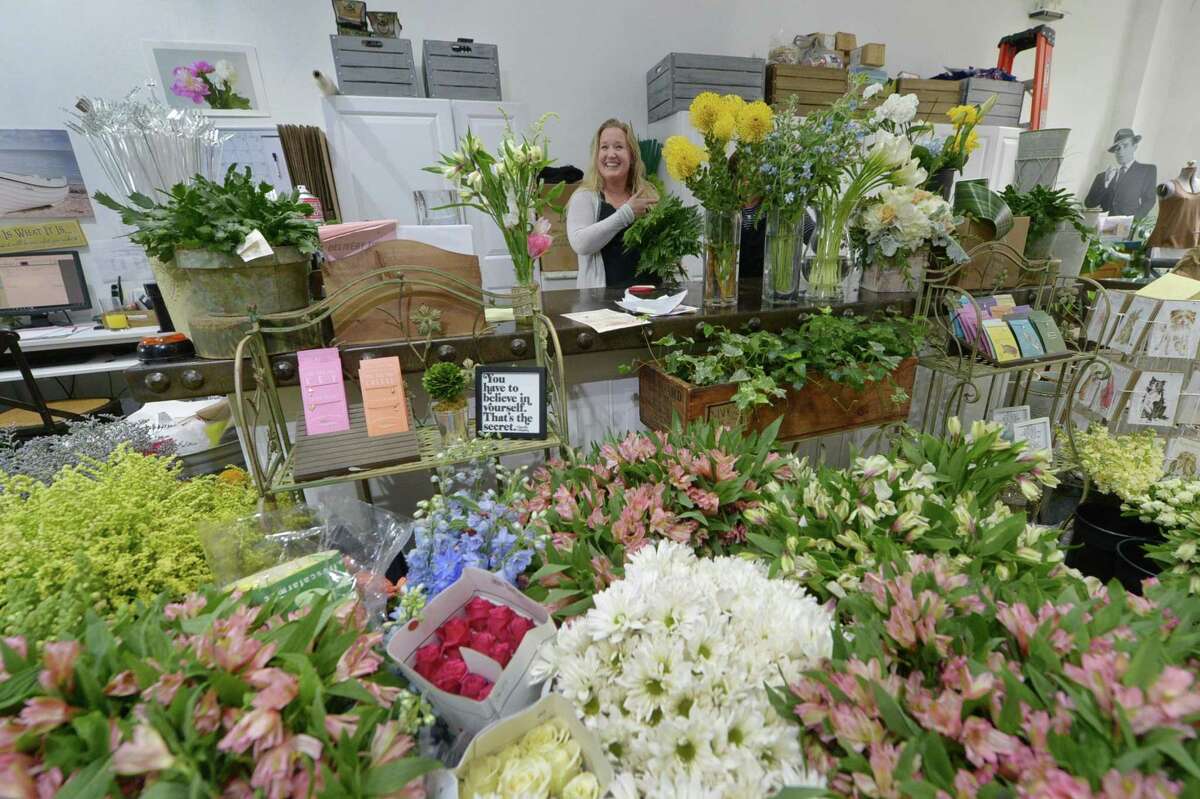 Amanda Wheeler in the newly relocated Braach's Flowers Wednesday, May 10, 2017, ready the shop for Mother?’s Day in their shop in South Norwalk, Conn. The flower shop has had just three owners dating back to the Great Depression.