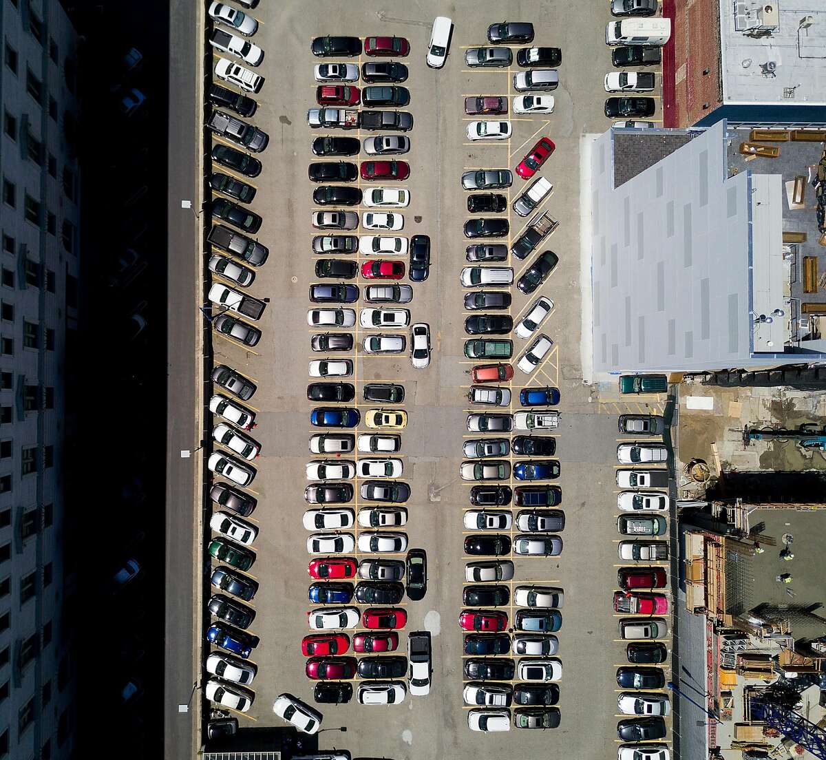 Cars line a parking lot at 1064 Mission St. on Thursday, May 4, 2017, in San Francisco. The site is under consideration for affordable housing development.