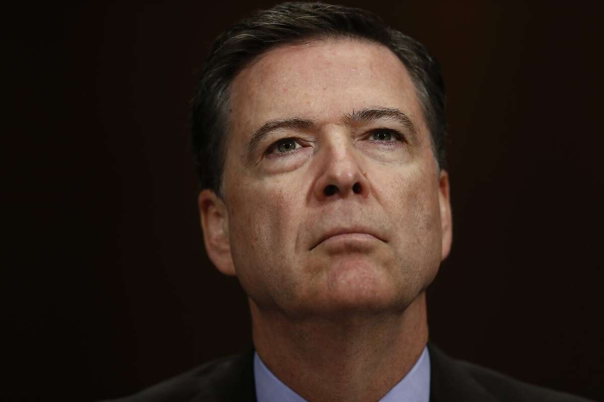 FILE- In this May 3, 2017, file photo, FBI Director James Comey listens on Capitol Hill in Washington. President Donald Trump’s firing of Comey added a new layer of uncertainty to the agency’s corporate criminal investigations. What might an FBI without a permanent leader, even for a short time, mean for ongoing cases of corporate misconduct? (AP Photo/Carolyn Kaster, File)