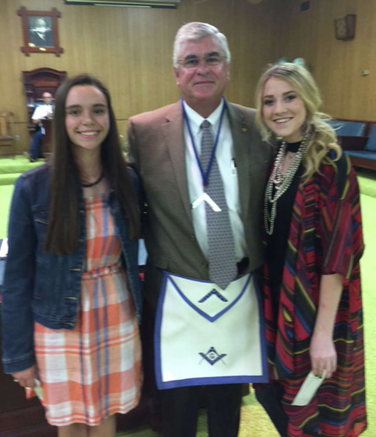 Plainview Masonic Lodge #709 has awarded $500 scholarships to two Plainview graduating seniors, Breana Roden (left) and Colti Wright. Making the presentation is Worshipful Master Ernie Gandy.