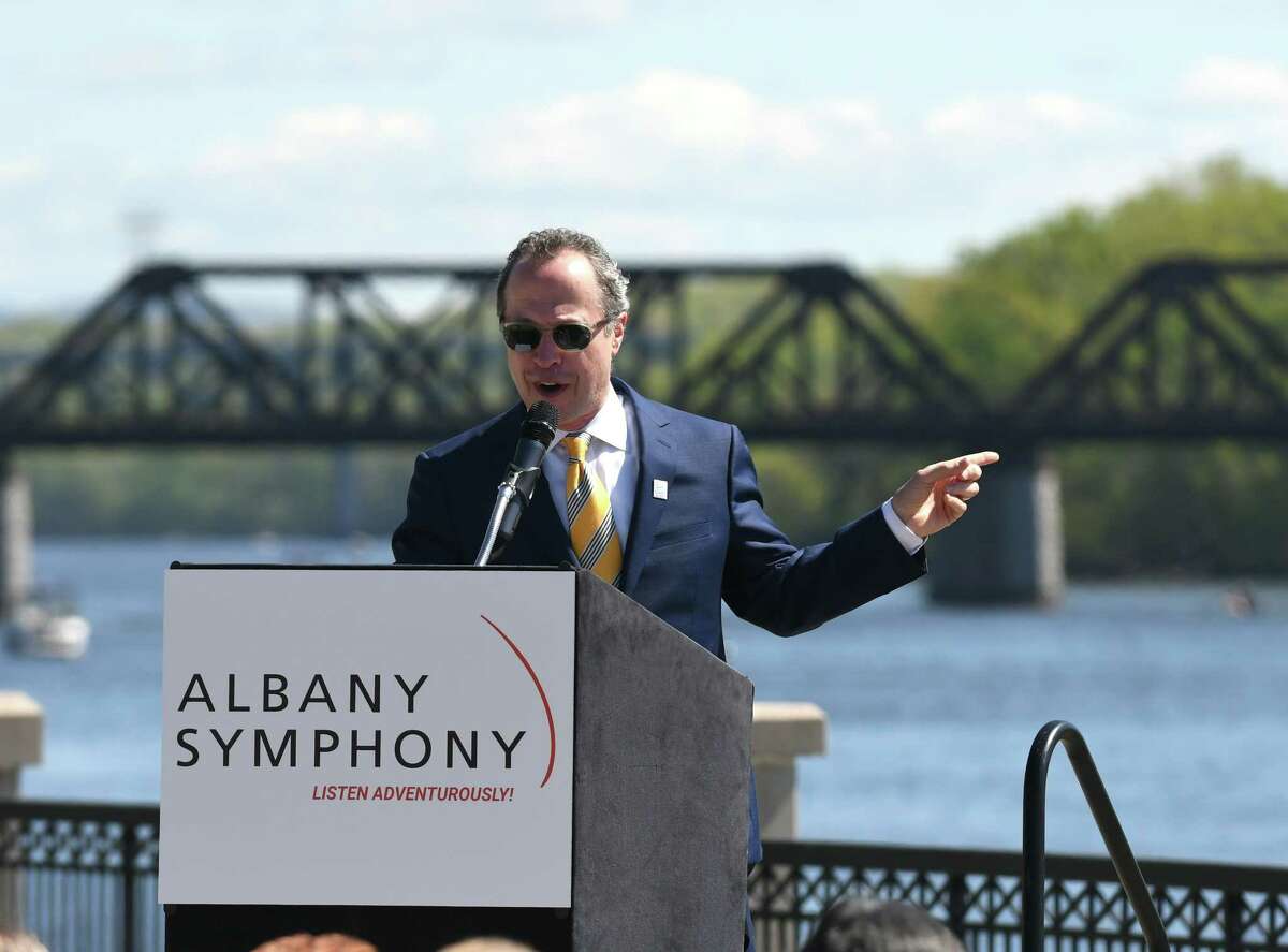 Albany Symphony conductor David Alan Miller speaks during a press conference to announce a seven-stop Erie canal concert performance by the symphony called "Water Music," on Friday morning, May, 12, 2017, at Jennings Landing in Albany, N.Y. The series will run from July 2-8. (Will Waldron/Times Union)