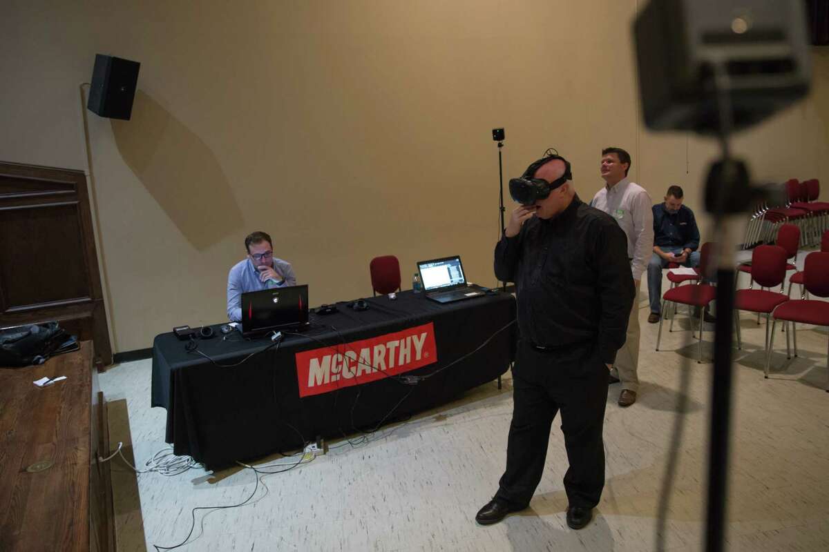 Warren Sneed, director of jazz studies as HSPVA, tours a virtual reality model of the school's new campus on Friday, May 12, 2017.