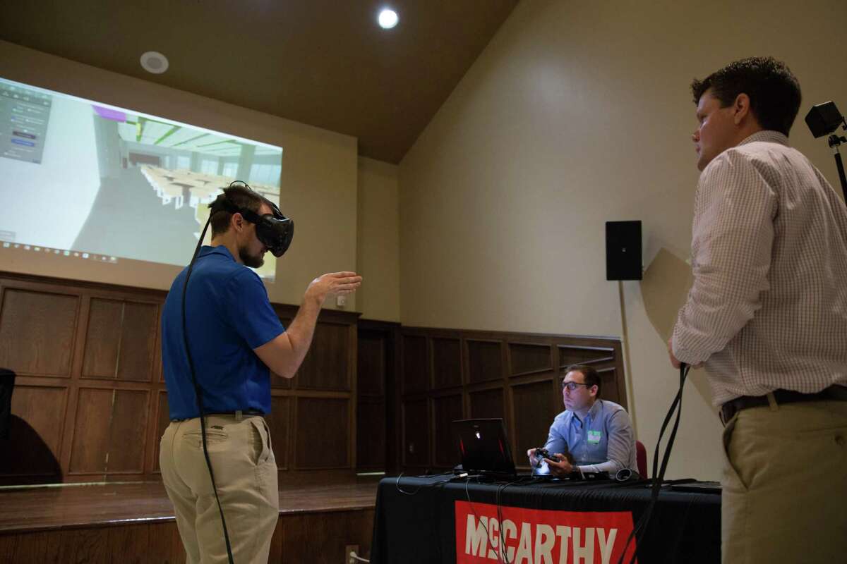 McCarthy Building Cos. presents a virtual reality model of a new Houston ISD school to teachers on Friday, May 12, 2017.