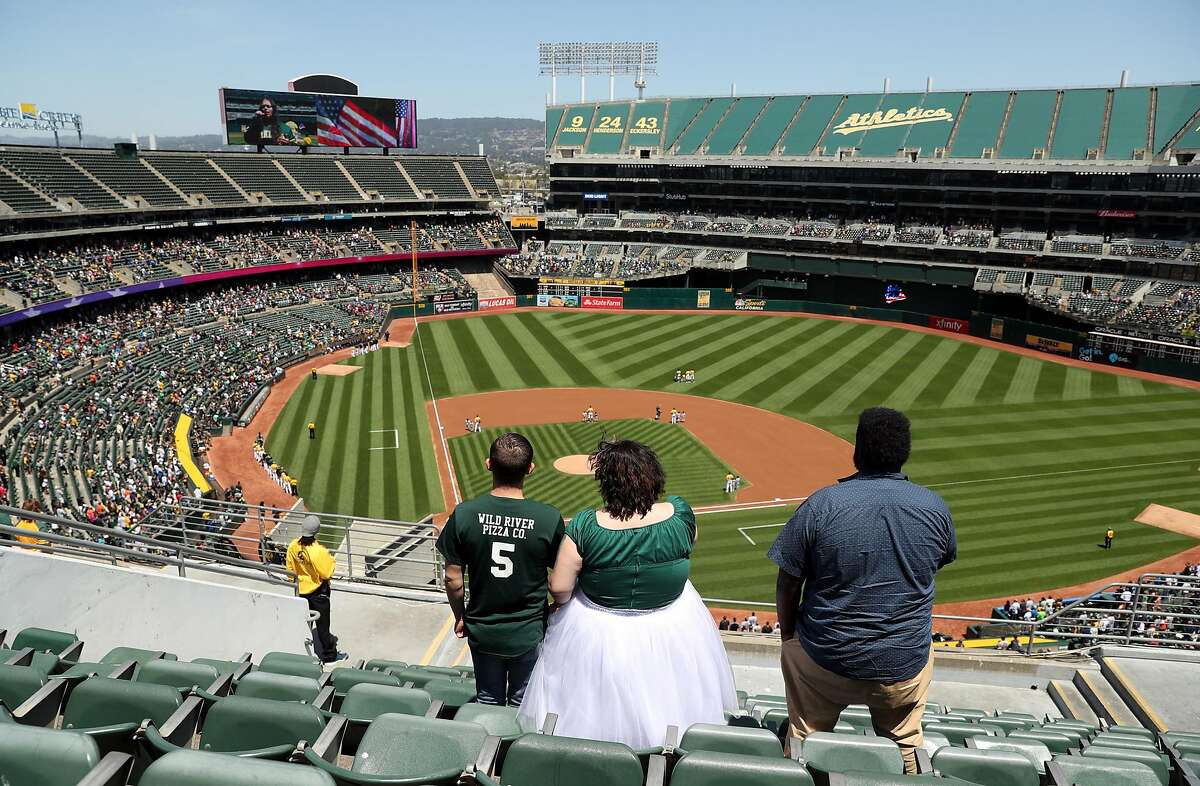 Oakland Athletics' fans stand during National Anthem before A's defeated the Detroit Tigers 8-6 during MLB game at Oakland Coliseum in Oakland, Calif., on Sunday, May 7, 2017.