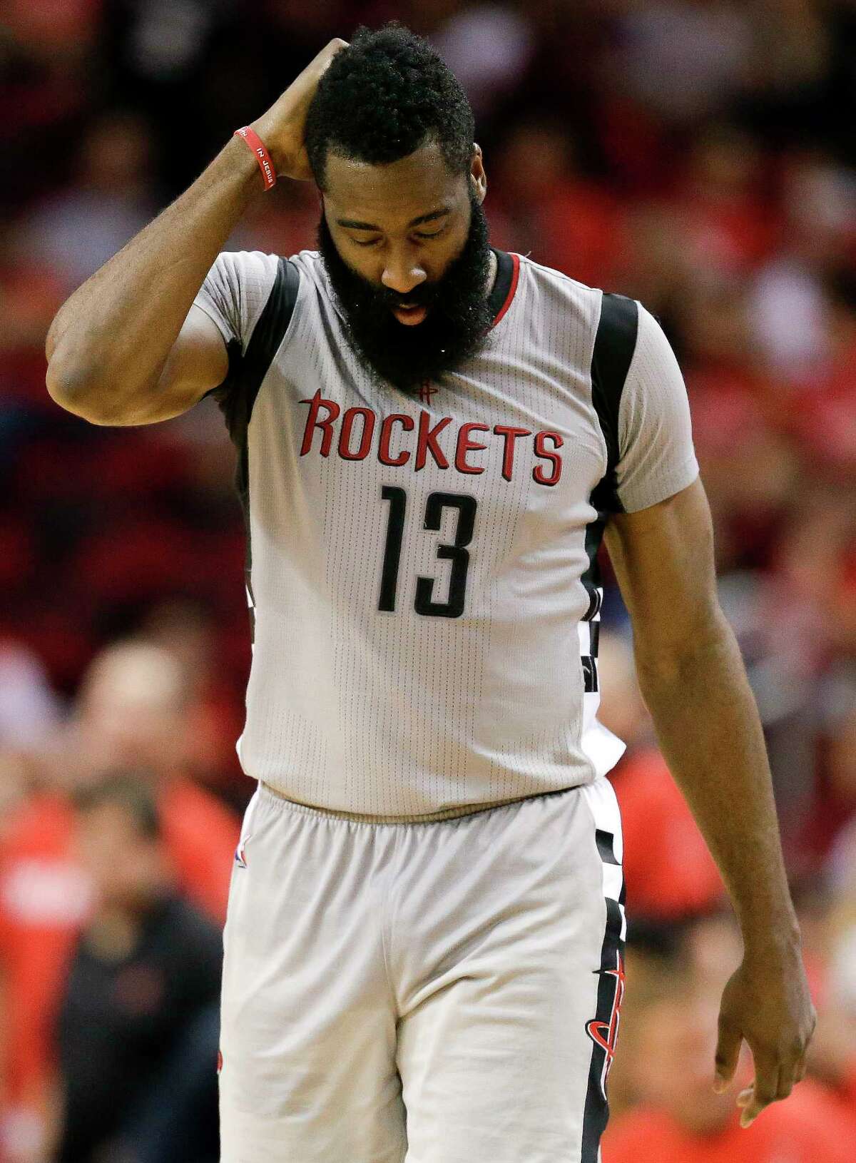Houston Rockets guard James Harden walks the court late in the fourth quarter in Game 6 of the team's NBA basketball second-round playoff series against the San Antonio Spurs, Thursday, May 11, 2017, in Houston. San Antonio won 114-75. (AP Photo/Eric Christian Smith)