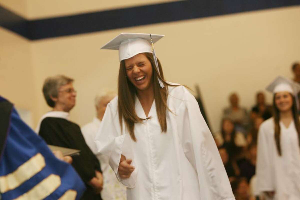 Kaila Casey, of Milford, reacts to shouts from the audience at Lauralton Hall commencement exercises in Milford on Sunday, June 6, 2010.