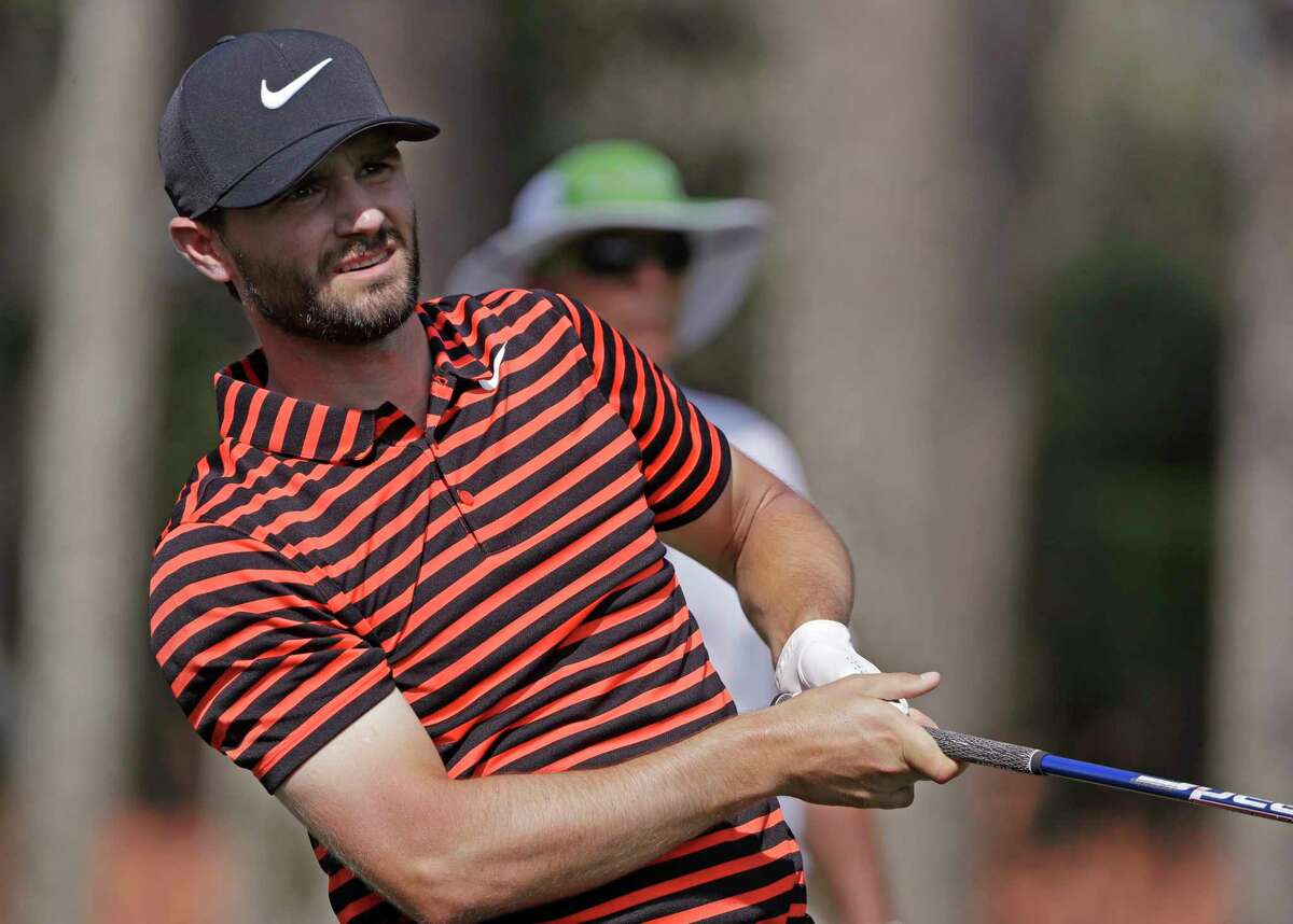 Kyle Stanley watches his shot from the sixth tee during the second round of The Players Championship golf tournament Friday, May 12, 2017, in Ponte Vedra Beach, Fla. (AP Photo/Chris O'Meara)