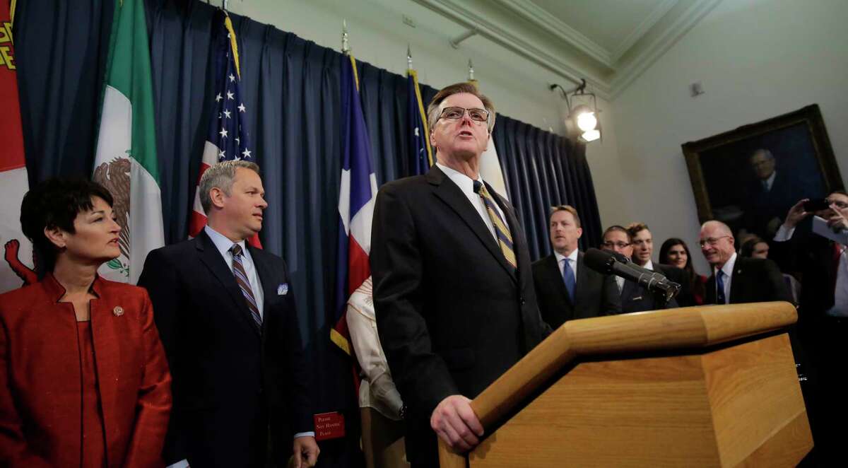 FILE - In this March 6, 2017, file photo, Texas Lt. Gov. Dan Patrick, center, with other legislators and supporters of Senate Bill 6, talks to the media at the Texas Capitol. Lawmakers now are approaching the end of the 85th legislative session not only in sniping, squabbling mode, which is not unusual, but also derelict in their essential duties. (AP Photo/Eric Gay, File)