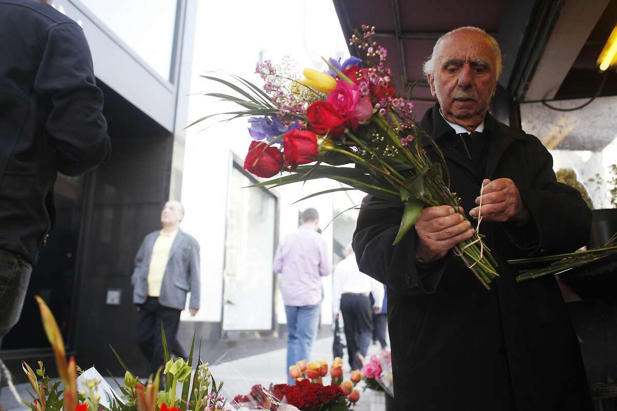 Al Nalbandian, 91, who has been running a flower stand at stockton and geary for 66 years, works in his usual spot on Friday March 22, 2013 in San Francisco, Calif.