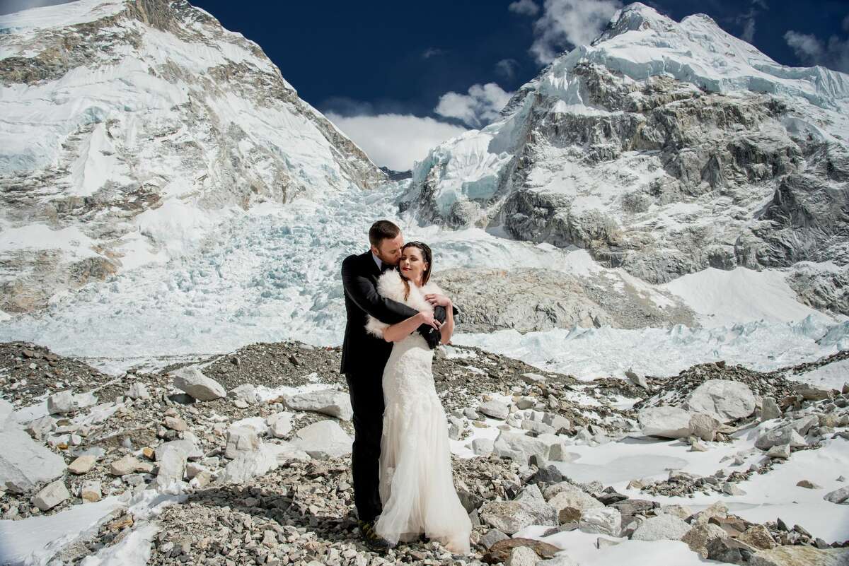Sacramento couple James Sissom and Ashley Schmieder wed at Everest Base Camp on March 16. Charleton Churchill captured the atypical nuptials, which took place 17,600 feet above sea level. 