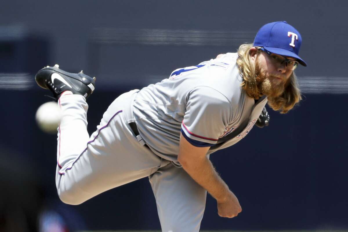 Texas Rangers starting pitcher A.J. Griffin works against a San Diego Padres batter during the first inning of a baseball game, Tuesday, May 9, 2017, in San Diego. Griffin pitched the second shutout of his career, and the Rangers won, 11-0. (AP Photo/Gregory Bull)