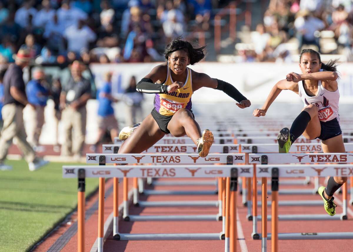 Semetria Smith of Midland High School competes in the Class 6A 100-meter hurdles event at the UIL State Track and Field Meet at Mike A. Myers Stadium in Austin, Texas, on Saturday, May 13, 2017.
