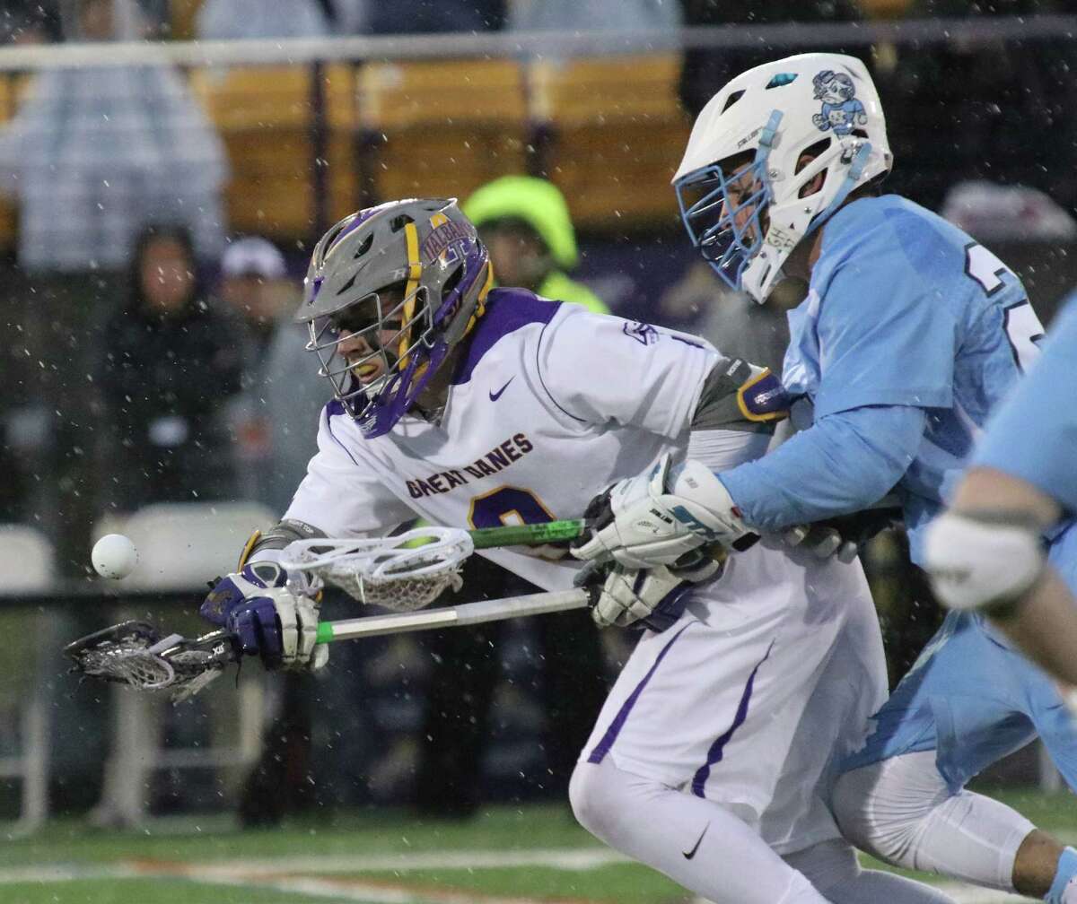 UAlbany's TD Ierlan wins the opening faceoff over North Carolina's Stephen Kelly during the first round of the NCAA Div 1 Men's Lacrosse Championship Saturday, May 13, 2017 at UAlbany's Casey Stadium. (Ed Burke photo - Special to The Times Union)