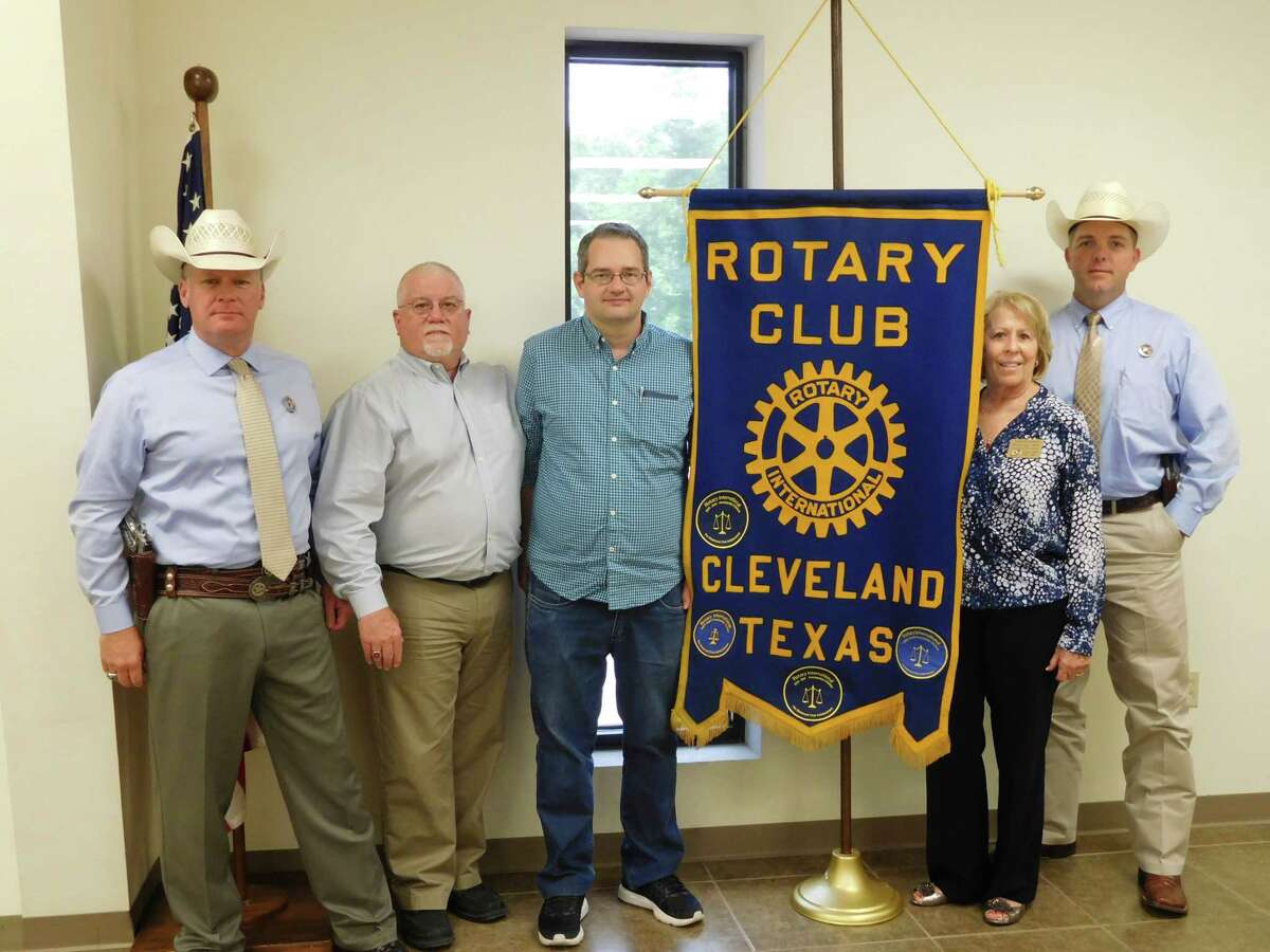 Cleveland Rotary Club speaker host Tarkington School Superintendent Kevin Weldon welcomed two Texas Rangers Â?– Ranger Ryan Clendennen and Ranger Brandon Bess Â?– to speak at the weekly program. Texas Rangers step in to assist with major incident crimes, border incidents, unsolved/serial crime, and more -- working alone or with local law enforcement wherever needed. Â Their skills, technology, and the fact that they are licensed (as are Game Wardens) with jurisdiction throughout Texas greatly enhance the investigative skills of the local community. Â Rotarian Ernestine Belt introduced another special guest Â?– Rotarian Thiago Facchini from Brazil, whom she met while attending a Rotary group study exchange. Â Pictured (left to right) are Ranger Brandon Bess, Rotarian and Superintendent Kevin Weldon, visiting Rotarian Thiago Facchini, Rotarian Ernestine Belt, and Ranger Ryan Clendennen.