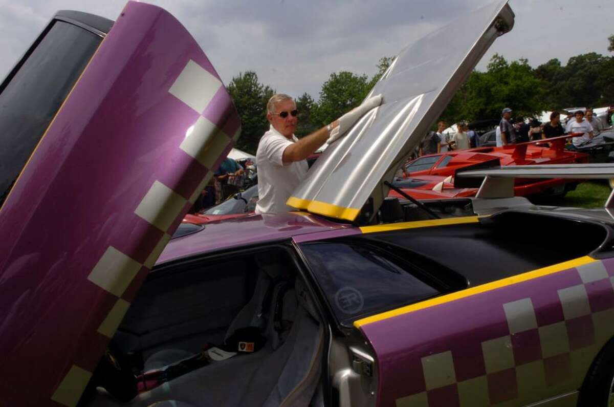 Greg Blacerak, of Rockville Center, New York, dusts off his 1991 Lamborghini Diablo Jota Americana which he races as well as drives, at the 15th annual Greenwich Concours d’Elegance at Roger Sherman Park on Sunday, June 6, 2010.