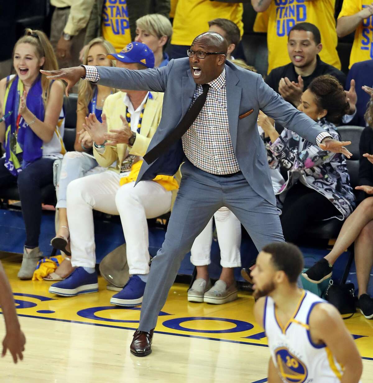 Golden State Warriors' interim head coach Mike Brown reacts in final minute of 4th quarter during Warriors' 113-111 win over San Antonio Spurs during Game 1 of NBA Western Conference Finals at Oracle Arena in Oakland, Calif., on Sunday, May 14, 2017.