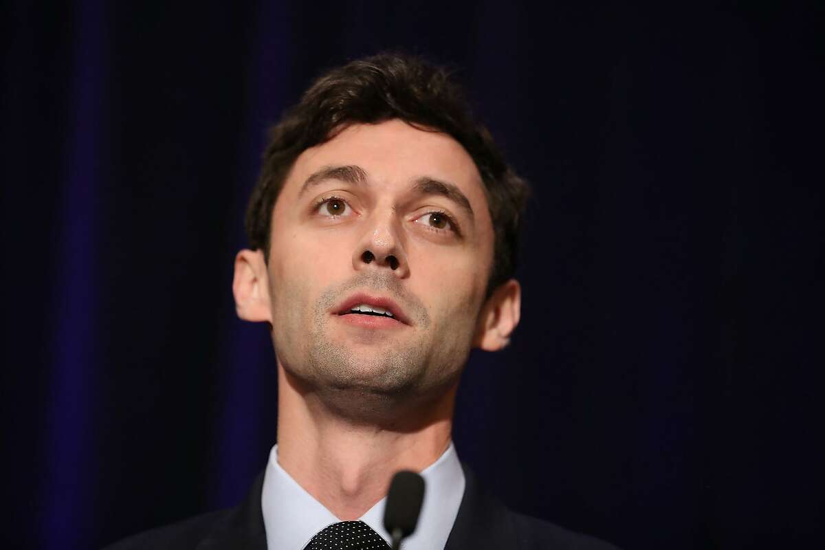 FILE-- Democratic candidate Jon Ossoff speaks to his supporters as votes continue to be counted in a race that was too close to call for Georgia's 6th Congressional District in a special election to replace Tom Price, who is now the secretary of Health and Human Services on April 18, 2017 in Atlanta, Georgia. The GOP used a San Francisco cable car for an attack ad on Ossaff, portraying him as a torchbearer for San Francisco liberals.