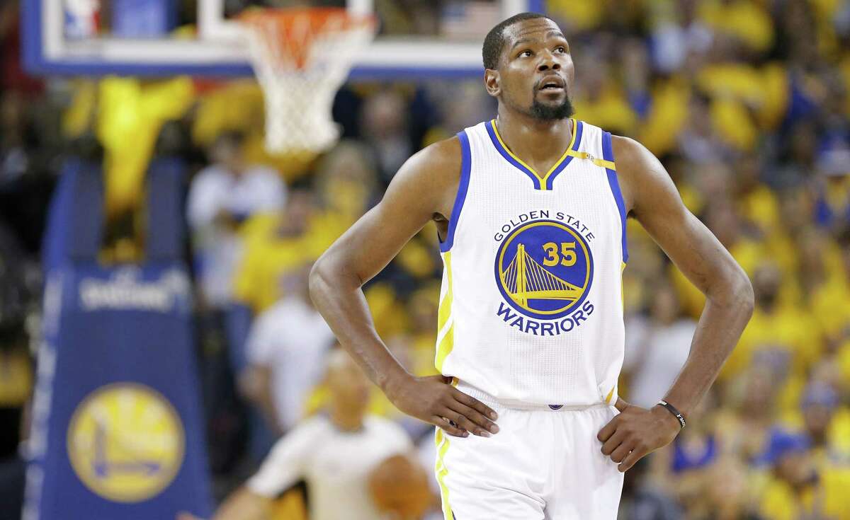Golden State Warriors’ Kevin Durant pauses during second half action of Game 1 in the Western Conference finals against the Spurs on May 14, 2017 at Oracle Arena in Oakland, Calif.