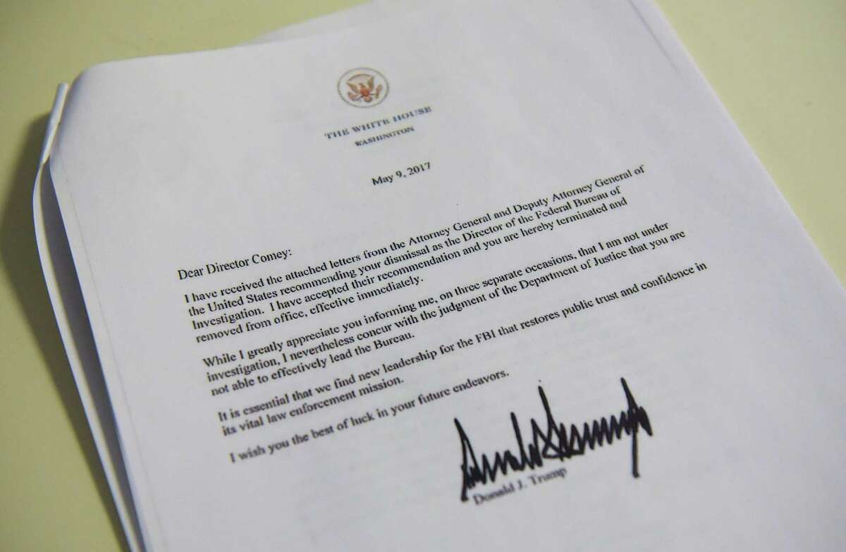 This file photo taken on May 09, 2017 shows a copy of the termination letter to FBI Director James Comey from US President Donald Trump seen at the White House in Washington, DC. President Donald Trump warned sacked FBI chief James Comey on May 12, 2017 not to "leak" details of their conversations to the media, and suggested they may have been recorded. "James Comey better hope that there are no 'tapes' of our conversations before he starts leaking to the press!" Trump wrote in one of a series of early morning tweets assailing critics and the media over their response to Comey's ouster. / AFP PHOTO / MANDEL NGANMANDEL NGAN/AFP/Getty Images