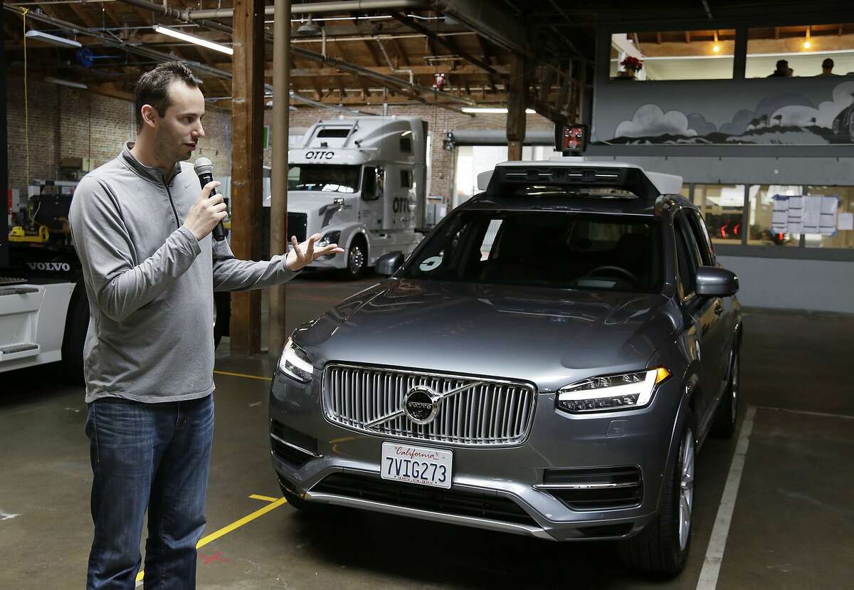 FILE- In this Dec. 13, 2016, file photo, Anthony Levandowski, head of Uber's self-driving program, speaks about their driverless car in San Francisco. Levandowski, an autonomous vehicle expert who defected from Google last year, notified Uber�s staff of that he is stepping aside Thursday, April 27, 2017, in an email. He will remain at Uber, but won�t oversee a crucial self-driving project targeted in lawsuit filed by Waymo, a rival started by Google. (AP Photo/Eric Risberg, File)