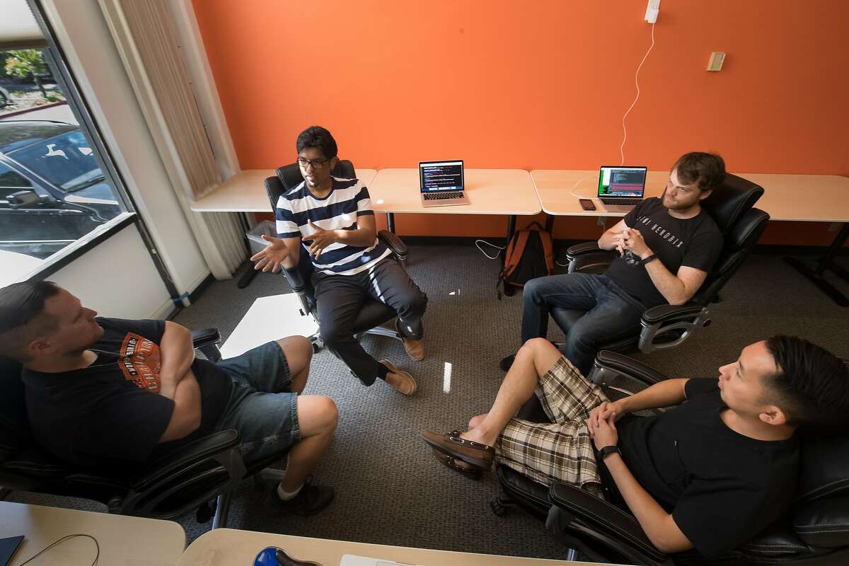 Prateek Joshi, founder of Pluto AI, meets with his engineer team, Geoff Neal, Ian Conway and Jimmy Nguyen in his new office on Monday, May 15, 2017 in Palo Alto, CA.