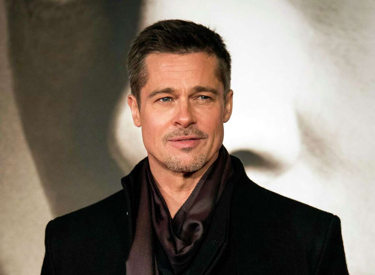 FILE - In this Nov. 21, 2016 file photo, Brad Pitt appears at the premiere of "Allied" in London. Pitt says there needs to be a rethinking of what winning the war in Afghanistan means and sending more American troops there will only cause more damage. The Oscar-nominated actor also said that the public should reassess how it supports soldiers and needs to do more than just give money to causes and give veterans a pat on the back. PittÂ?’s comments came in an interview last week in which the actor was discussing his life, and his upcoming Netflix film Â?“War Machine.Â?” (Photo by Vianney Le Caer/Invision/AP, File)