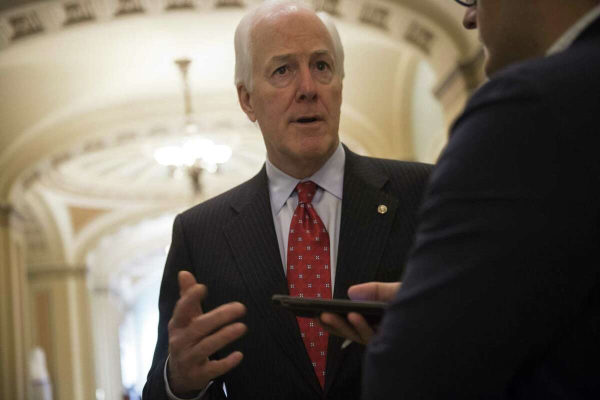 (FILES) This file photo taken on May 10, 2017 shows US Senate Republican Whip John Cornyn, Republican of Texas, speaking with reporters outside his office at the US Capitol in Washington, DC. Cornyn is in consideration to replace former FBI Director James Comey after US President Donald Trump's shock dismissal of Comey -- the man overseeing federal investigations into suspected Kremlin interference in the 2016 vote -- has sparked a political firestorm in Washington and plunged his young presidency in turmoil. / AFP PHOTO / SAUL LOEBSAUL LOEB/AFP/Getty Images
