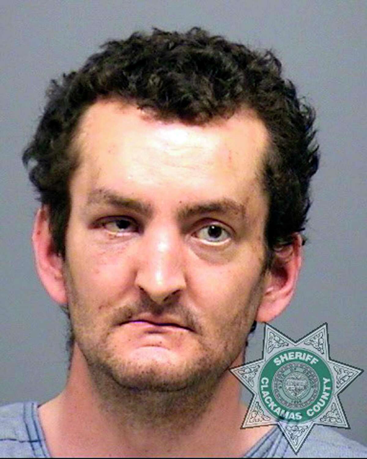 This undated photo provided by the Clackamas County Sheriff's office shows Joshua Webb. Webb has been arrested and charged with murder and attempted murder in connection with the stabbing of a grocery employee in Estacada, Ore., Sunday, May 15, 2017, and the discovery of his mother's body in the house they both shared. (Clackamas County Sheriff's Office via AP)