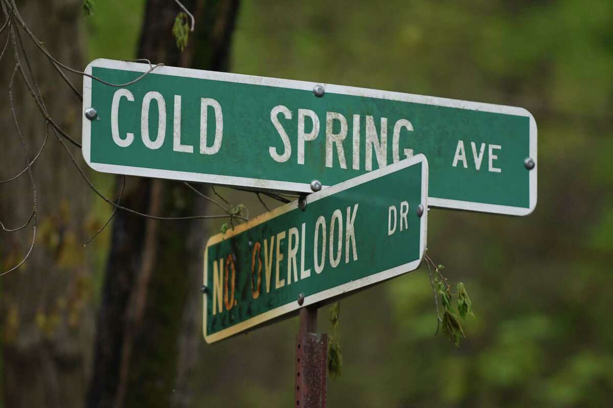 Road sign at Cold Spring Avenue and No Overlook Drive near the scene of a fire on Monday, May 15, 2017, in Schodack, N.Y. Authorities said someone set fire to a building at 29 Cold Spring on Sunday and the fire is considered a hate crime. Schodack police do not identify the race or religion of the homeowners but a source says the victims are black. (Will Waldron/Times Union)
