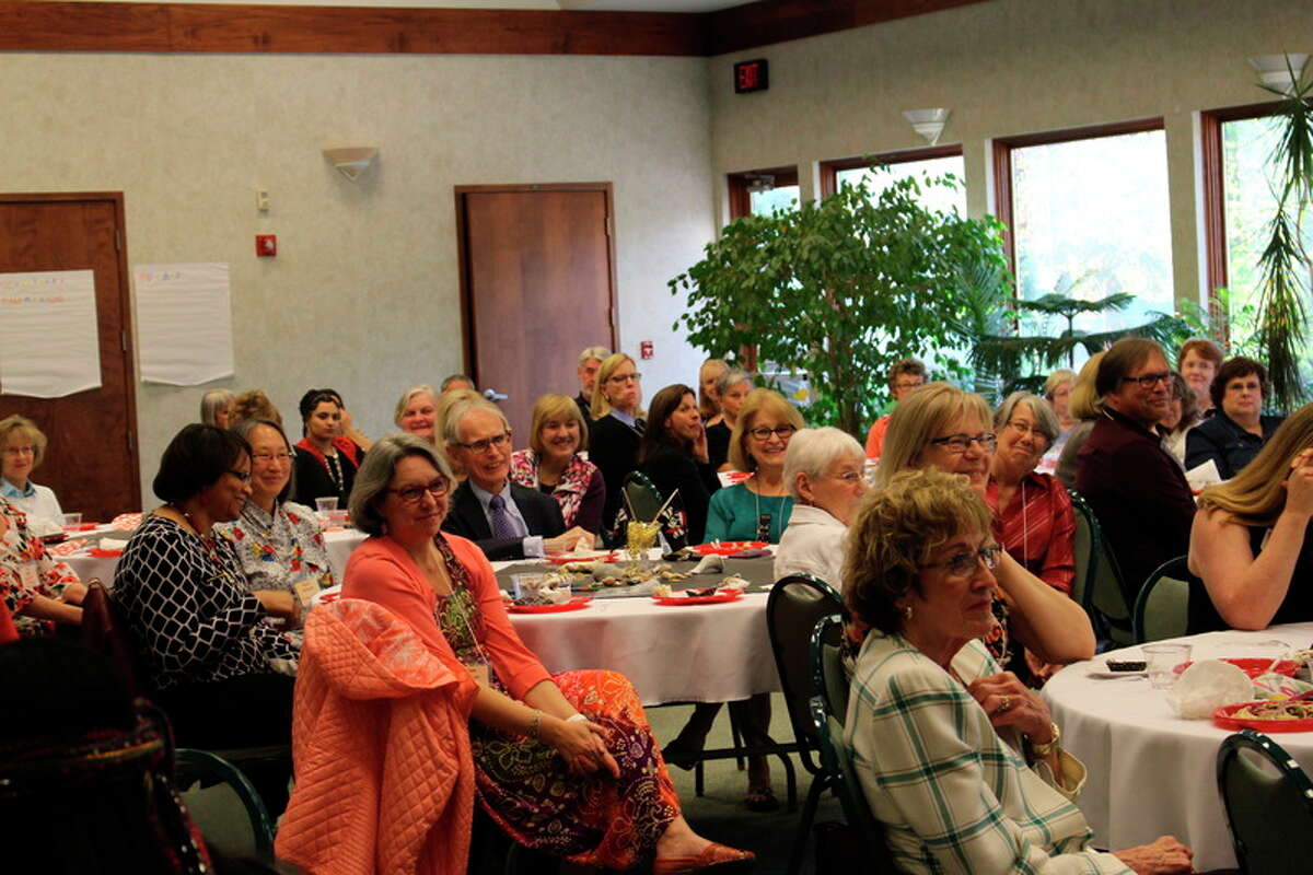 Volunteer literacy tutors and other guests enjoy The Legacy Center's annual Tutor Appreciation Dinner on Thursday. More than 50 of the agency's 154 volunteers attended the event at Trinity Lutheran Church.