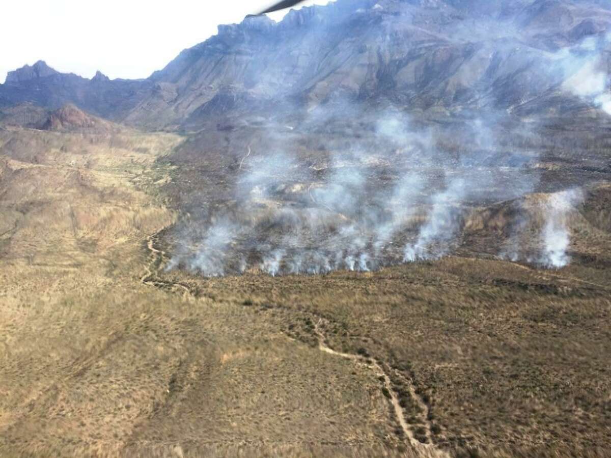 Big Bend National Park staff reopened the popular Chisos Basin campground Thursday as a wildfire in the park continued to smolder out. Shown is a photo of the fire from earlier in the week.