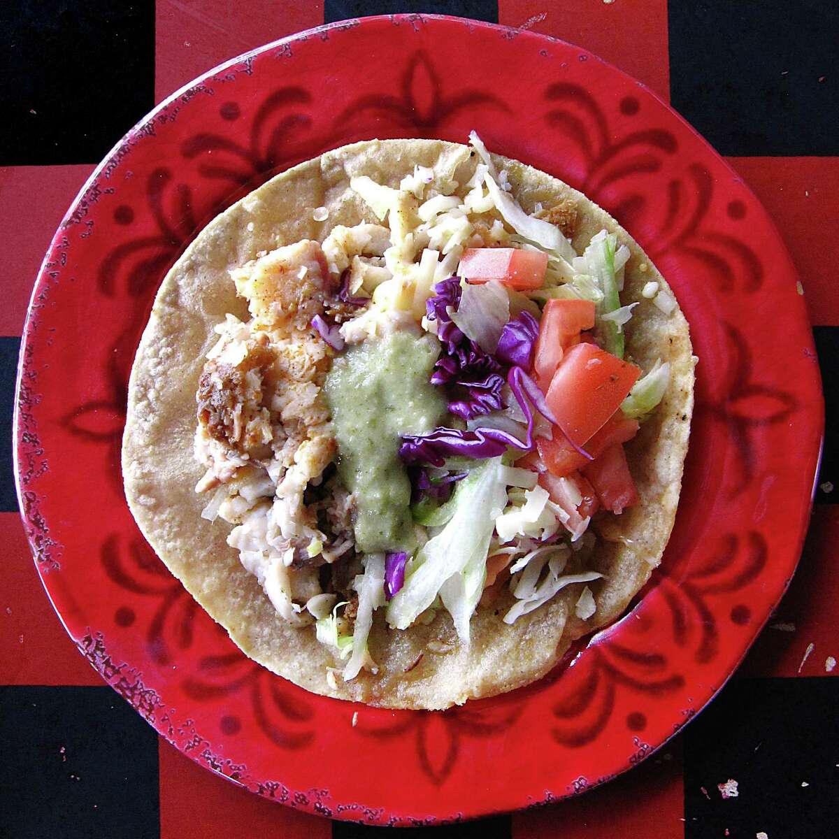 Fish taco on a handmade corn tortilla from Lee's El Taco Garage