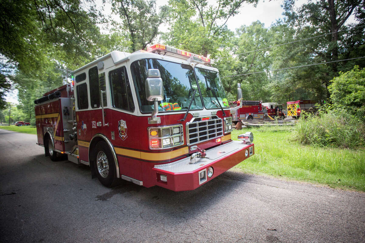 Firefighters respond to a mobile home fire on Tuesday, May 16, 2017, on the 18000 block of Walnut Hills Drive in east Montgomery County.